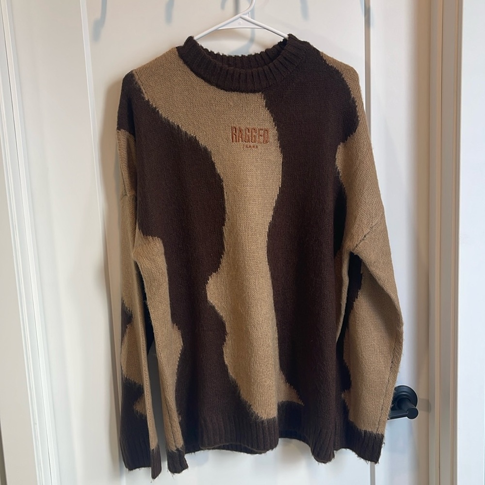 Ragged priest sweater